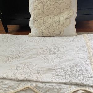Lenox quilt for king bed and matching pillow.